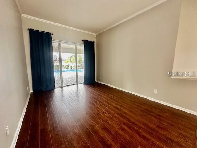 806 Winder Oaks Drive Gotha, FL 34734 - Photo 19 of 47 wooden floor in an empty room with a window