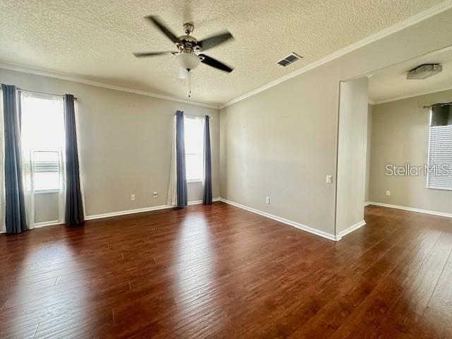 806 Winder Oaks Drive Gotha, FL 34734 - Photo 21 of 47 a view of an empty room with wooden floor and a window