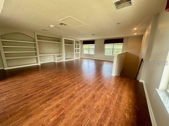 806 Winder Oaks Drive Gotha, FL 34734 - Photo 26 of 47 a view of a livingroom with furniture and wooden floor