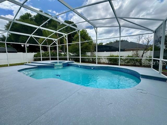 806 Winder Oaks Drive Gotha, FL 34734 - Photo 35 of 47 a view of a backyard with a swimming pool