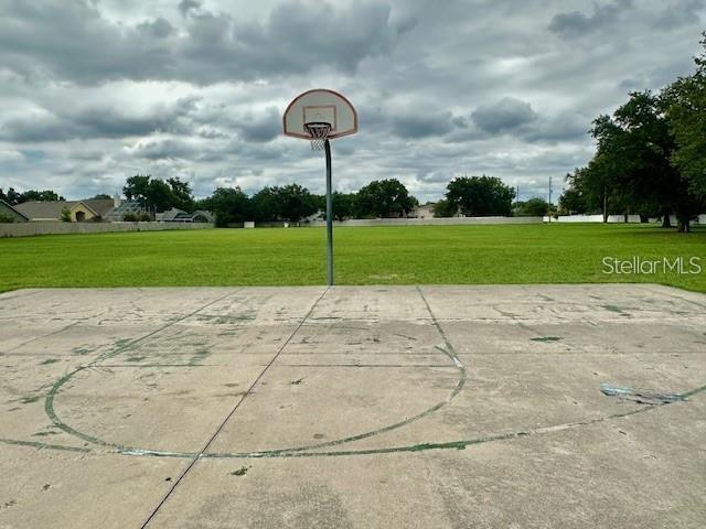 806 Winder Oaks Drive Gotha, FL 34734 - Photo 45 of 47 a view of a playground with brick walls