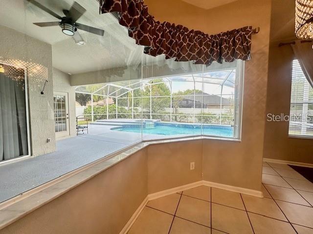 806 Winder Oaks Drive Gotha, FL 34734 - Photo 7 of 47 a view of an empty room with a window