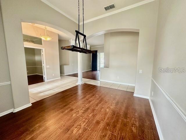 806 Winder Oaks Drive Gotha, FL 34734 - Photo 8 of 47 a view of empty room with wooden floor