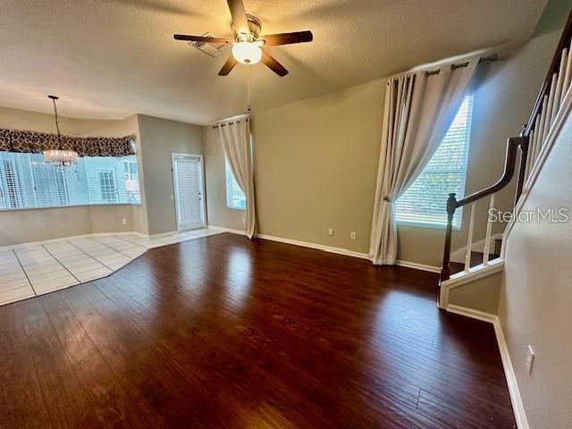 806 Winder Oaks Drive Gotha, FL 34734 - Photo 9 of 47 a view of an empty room with wooden floor and a window
