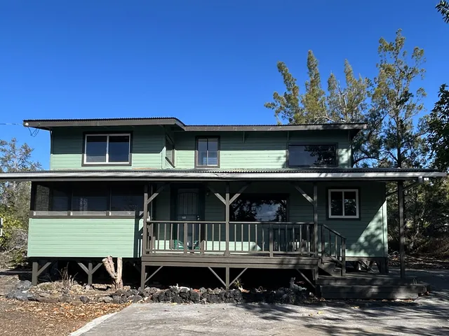 a front view of a house with a porch