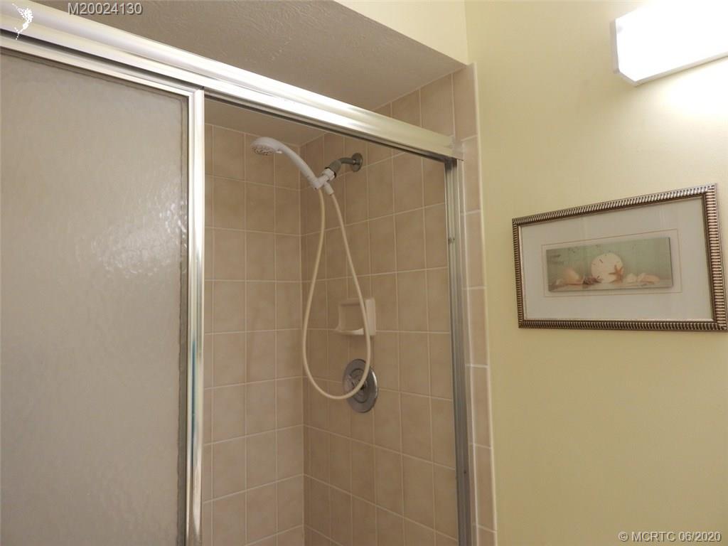 2950 Southeast Ocean Boulevard, Unit 1225 Stuart, FL 34996 - Photo 19 of 39 a bathroom with a shower
