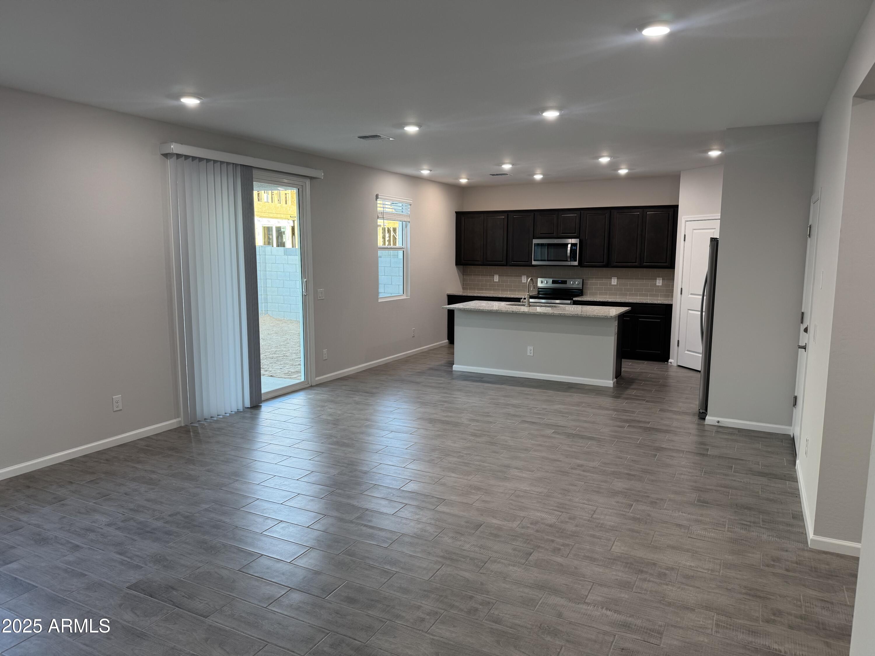 2693 East Boulder Avenue Apache Junction, AZ 85119 - Photo 5 of 22 Kitchen and great room