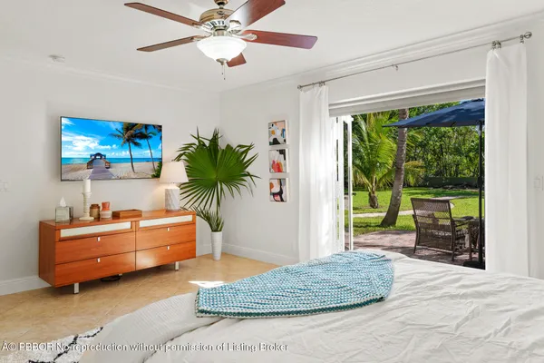a bathroom with a shower sink and mirror