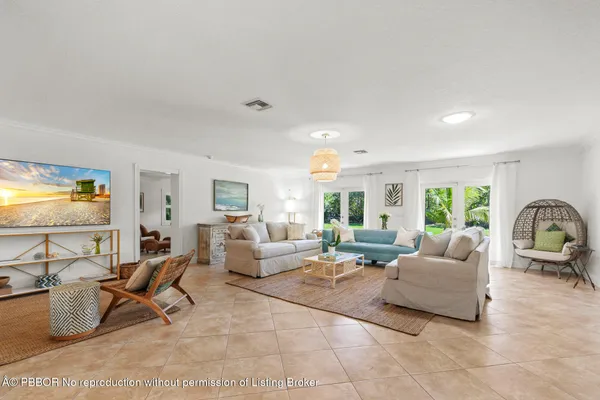 a kitchen with granite countertop a sink a counter space appliances and cabinets