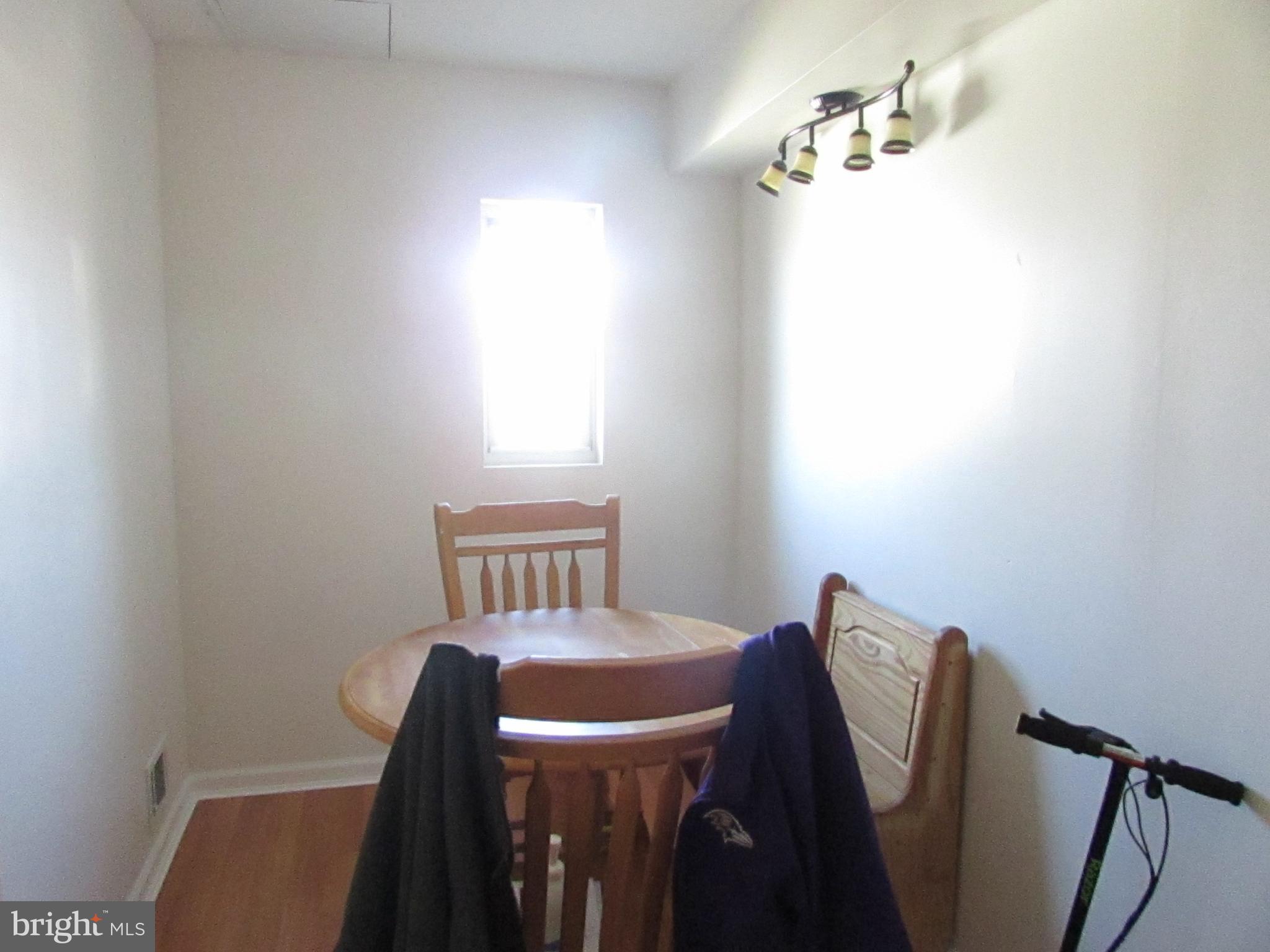 8268 Kavanagh Road Baltimore, MD 21222 - Photo 14 of 30 DINING ROOM WITH CUSTOM FLOOR MOLDING