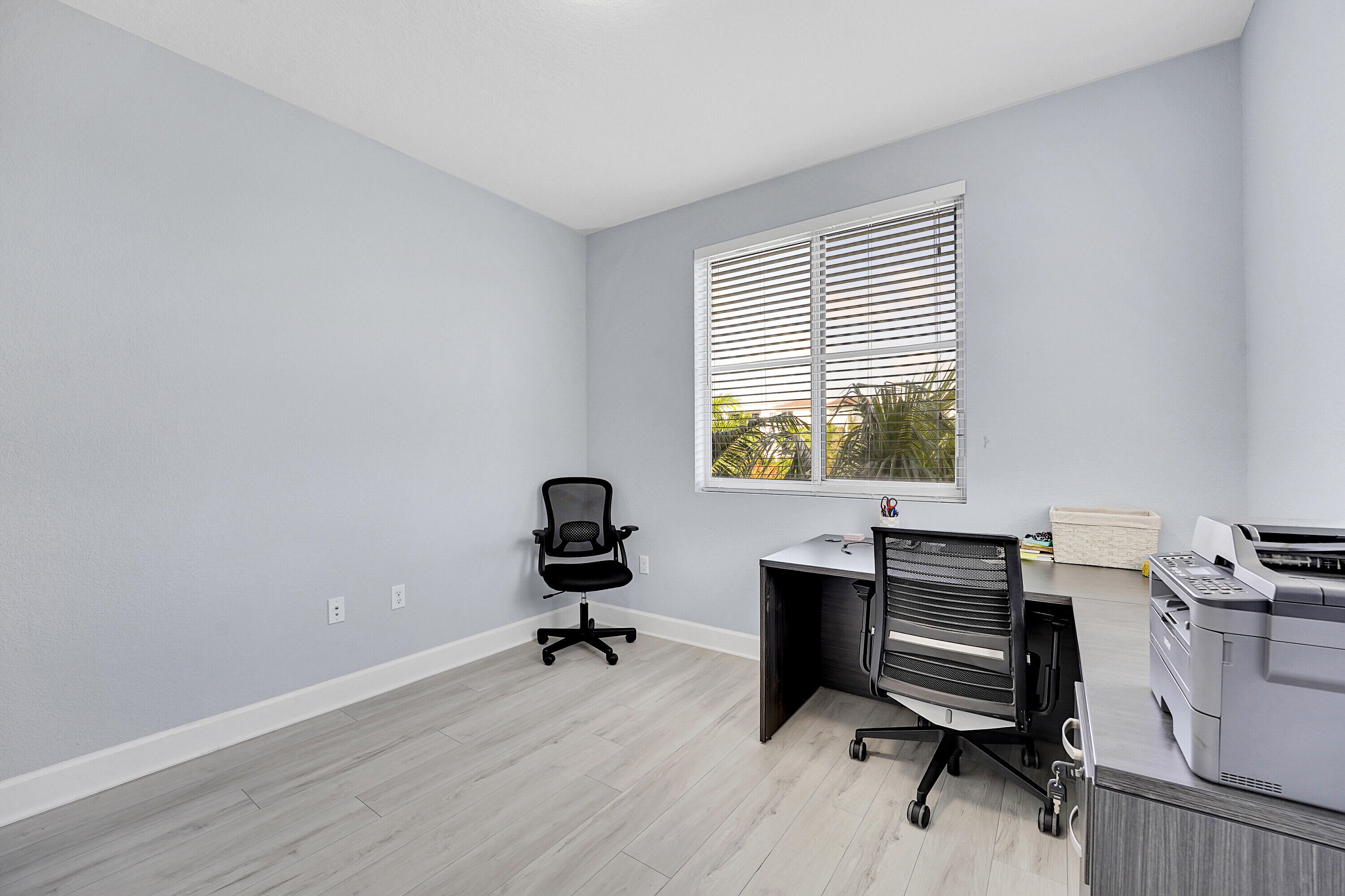 1690 Renaissance Commons Boulevard, Unit 1401 Boynton Beach, FL 33426 - Photo 25 of 43 a view of a workspace with a window