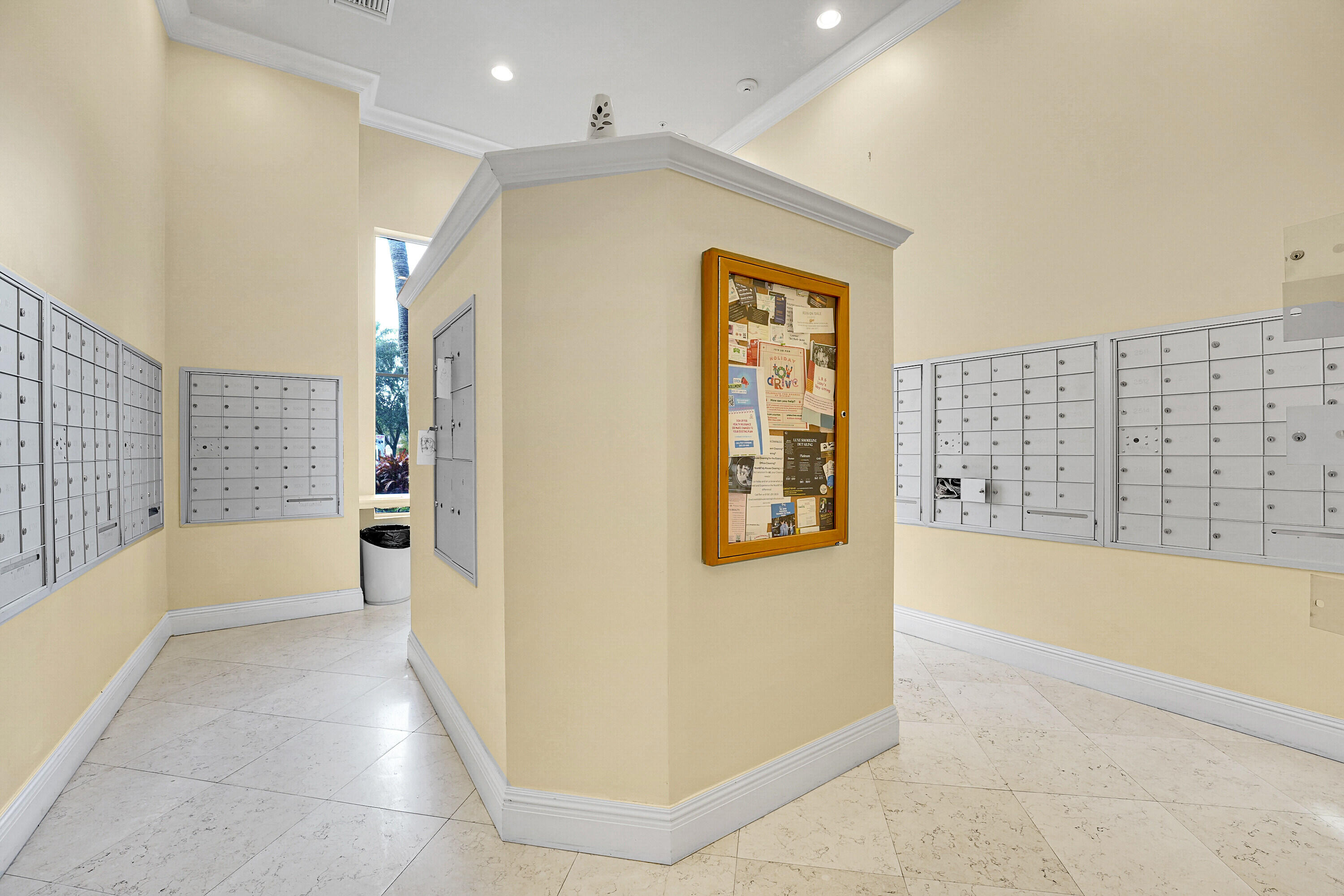 1690 Renaissance Commons Boulevard, Unit 1401 Boynton Beach, FL 33426 - Photo 31 of 43 a bathroom with a bathtub and shower