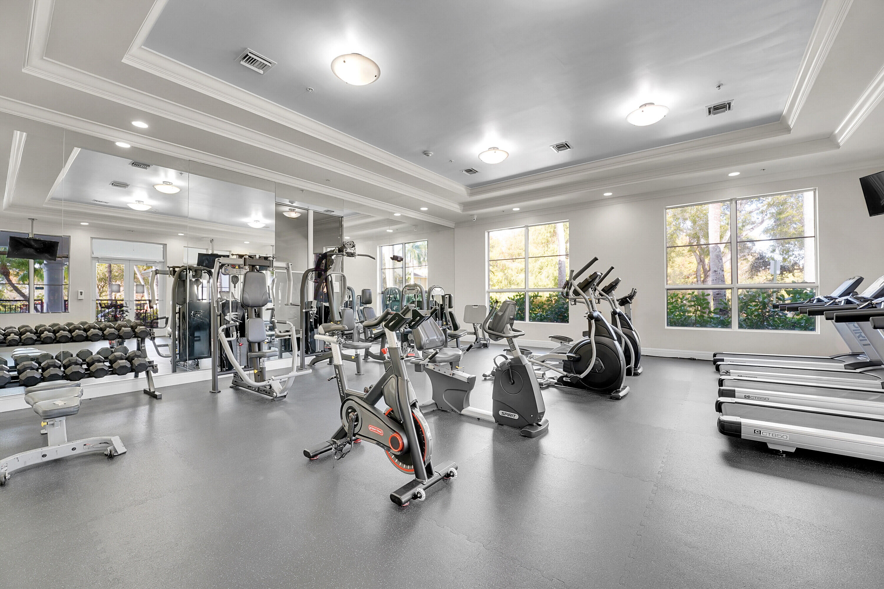1690 Renaissance Commons Boulevard, Unit 1401 Boynton Beach, FL 33426 - Photo 33 of 43 a view of a room with gym equipment