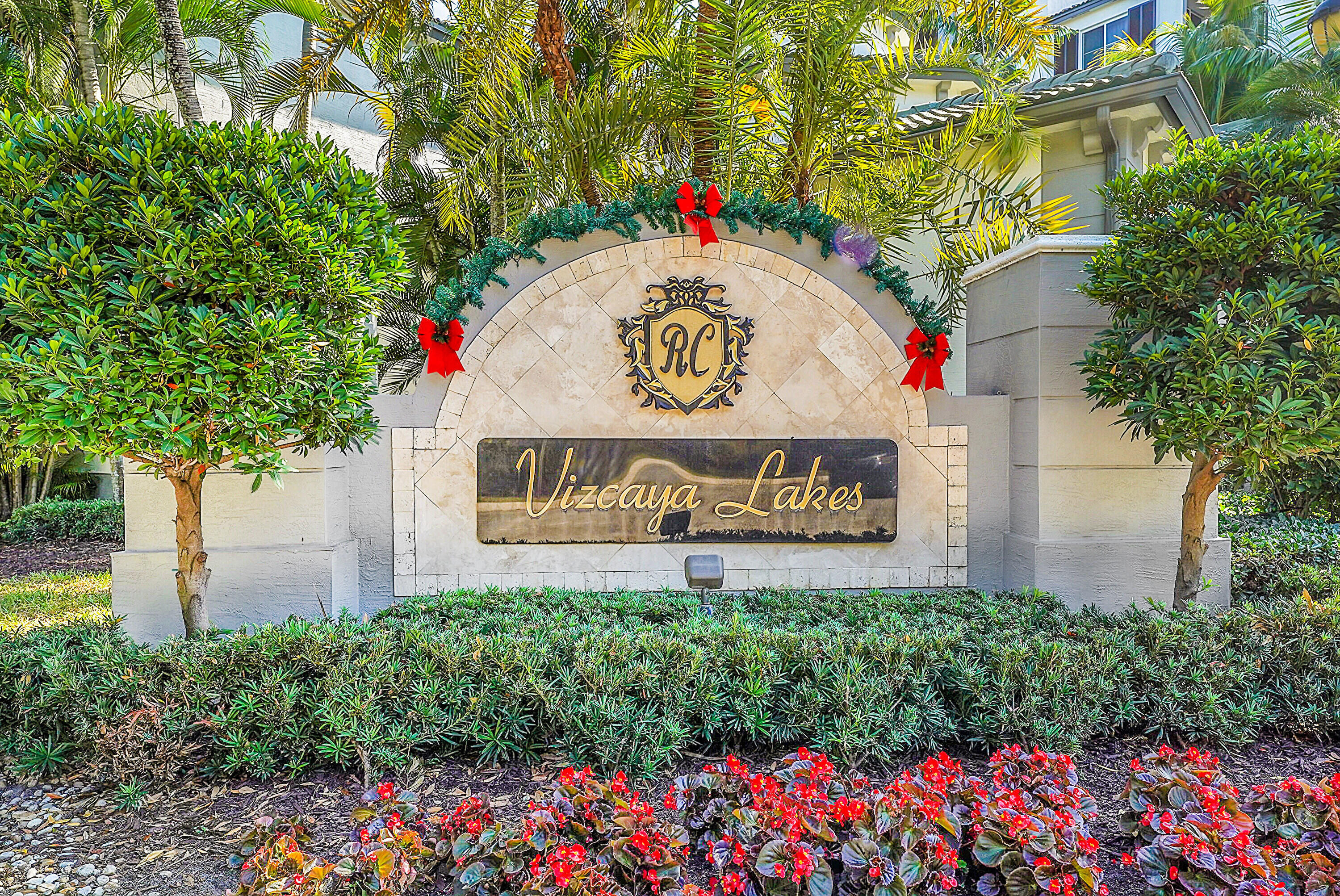 1690 Renaissance Commons Boulevard, Unit 1401 Boynton Beach, FL 33426 - Photo 40 of 43 a sign on the side of the road