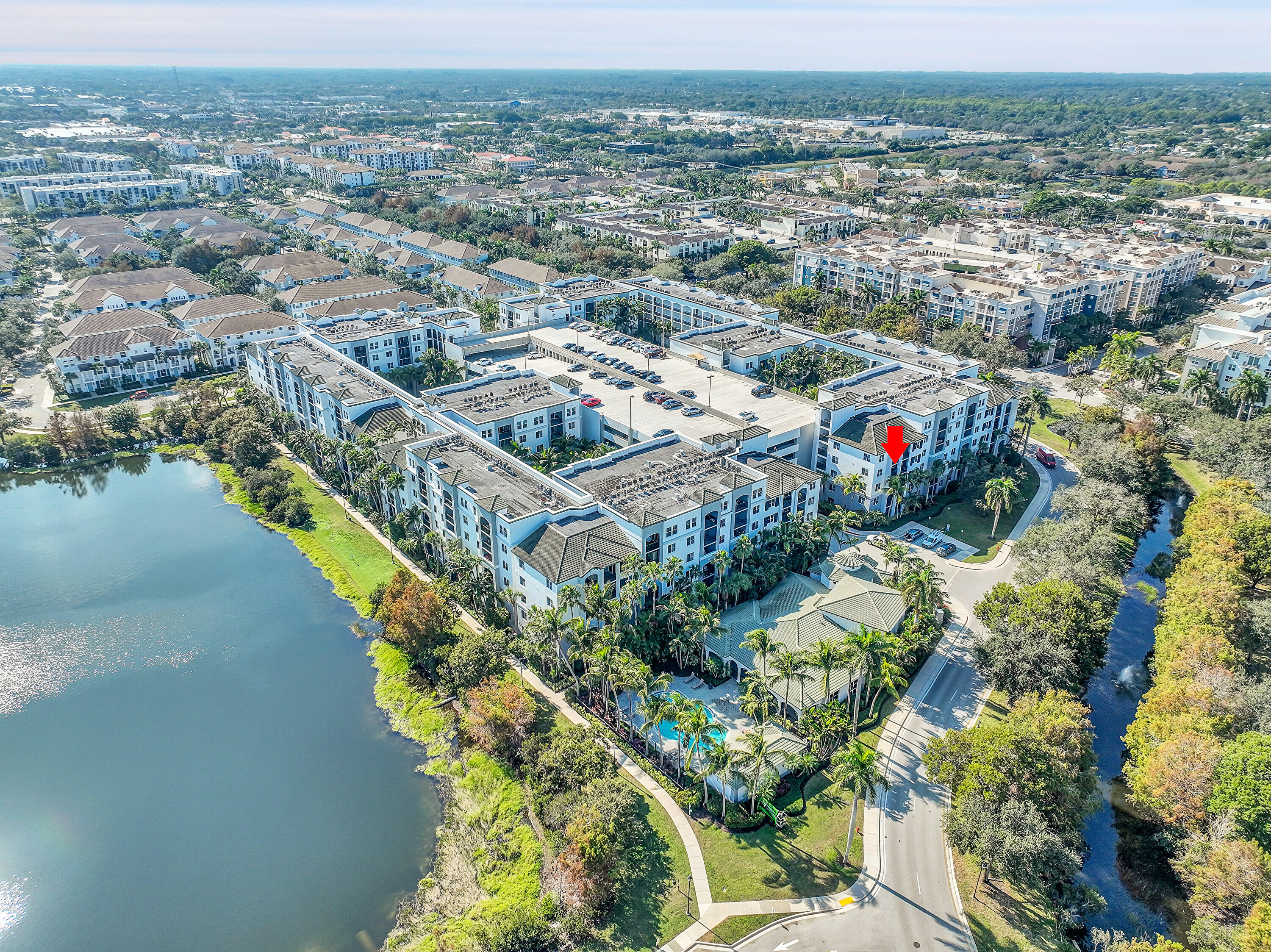 1690 Renaissance Commons Boulevard, Unit 1401 Boynton Beach, FL 33426 - Photo 42 of 43 an aerial view of residential building and lake