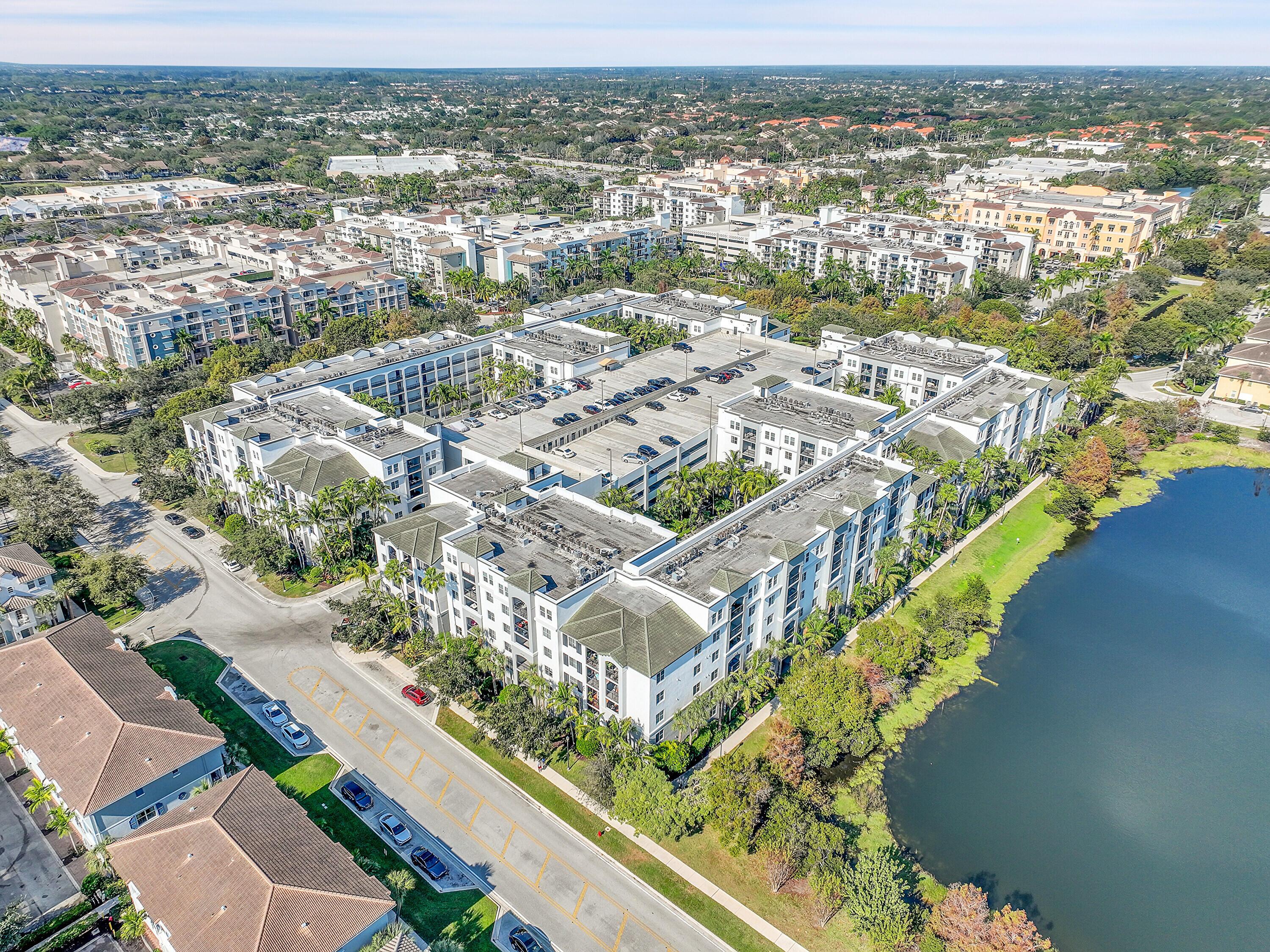 1690 Renaissance Commons Boulevard, Unit 1401 Boynton Beach, FL 33426 - Photo 43 of 43 an aerial view of residential houses with outdoor space