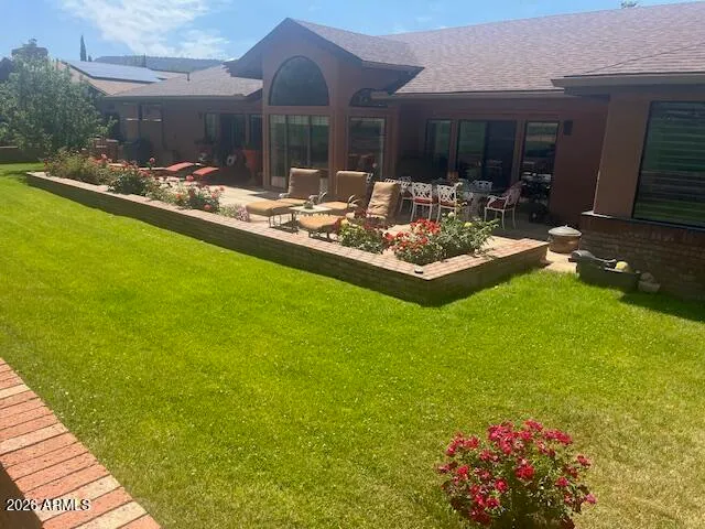 a view of swimming pool and patio