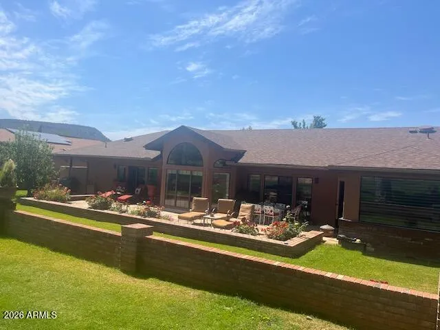 a view of a swimming pool with a patio