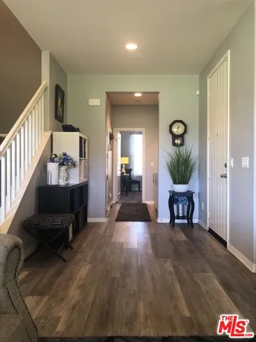 a bathroom with a toilet a sink and a shower