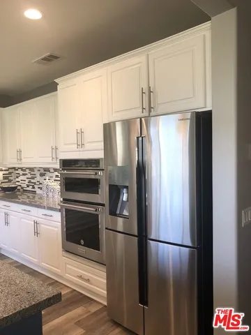 a backyard of a house with seating space