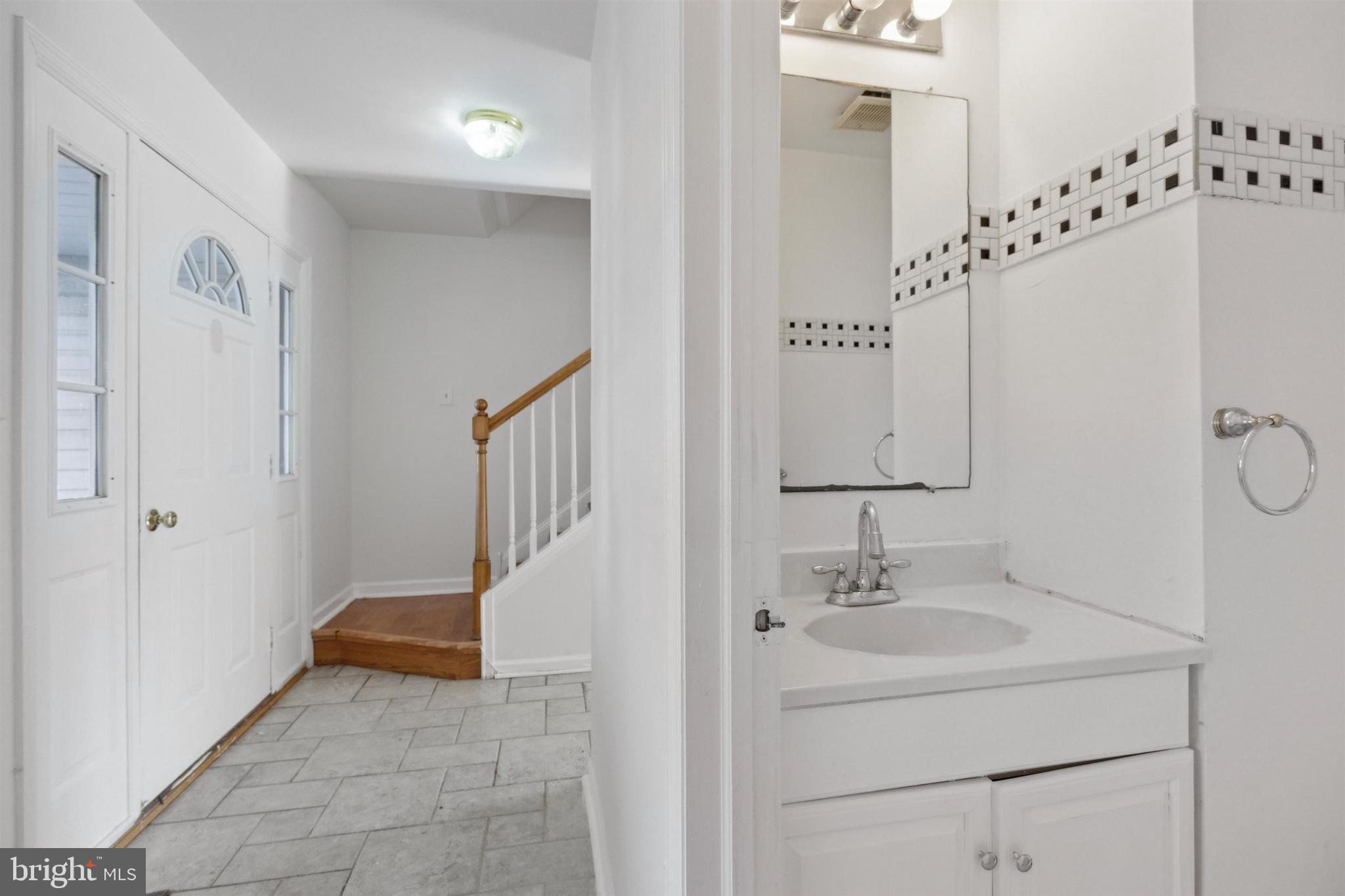 4420 Kelly Lane Reading, PA 19606 - Photo 12 of 25 a bathroom with a sink and a mirror
