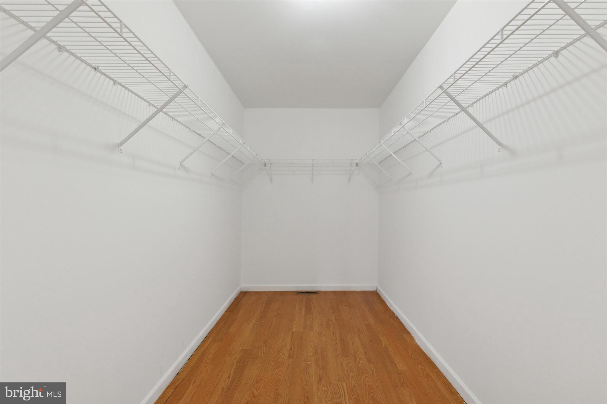 4420 Kelly Lane Reading, PA 19606 - Photo 15 of 25 a view of a room with linen closet and wooden floor
