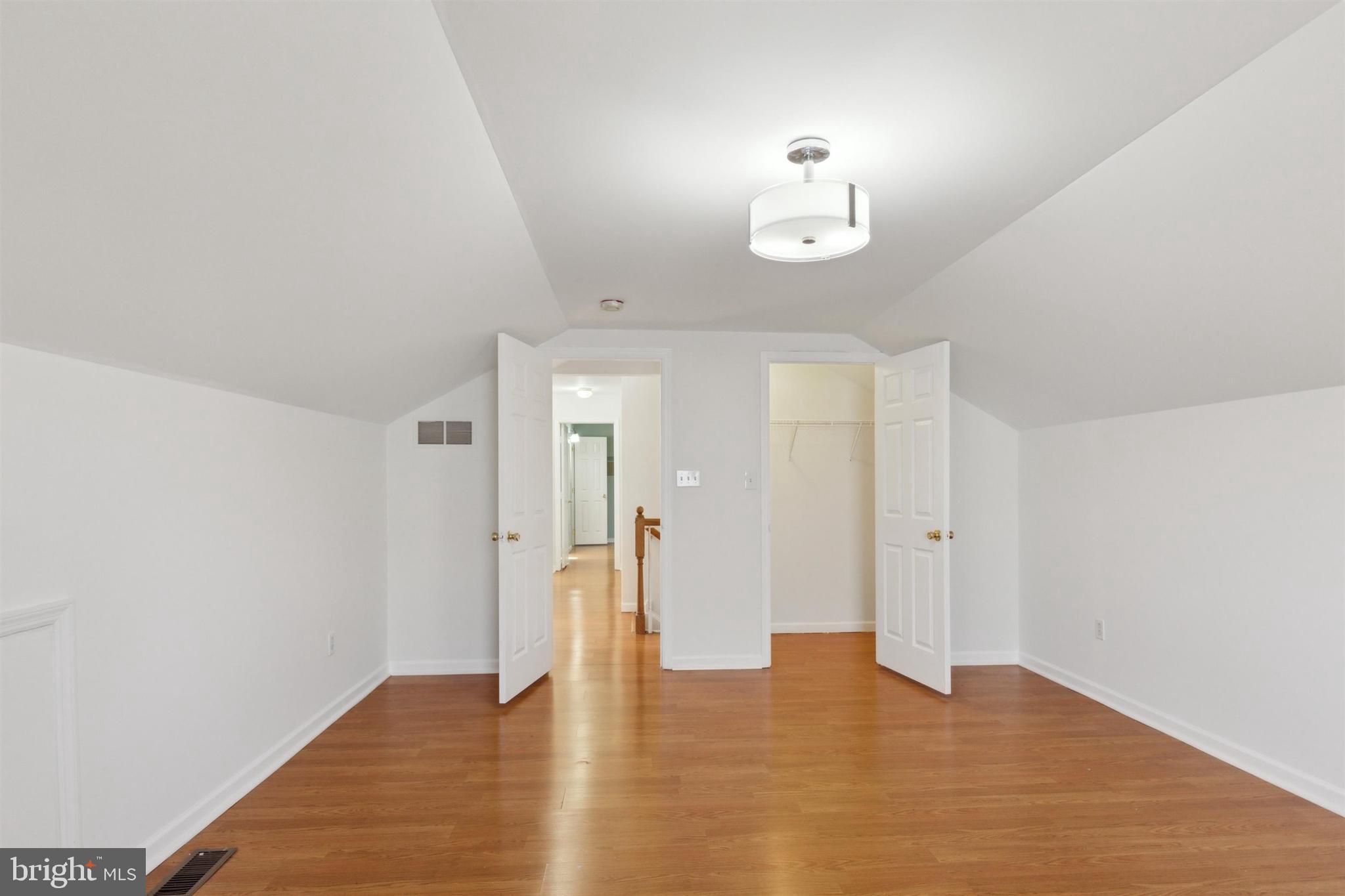 4420 Kelly Lane Reading, PA 19606 - Photo 19 of 25 a view of an empty room with wooden floor and a window