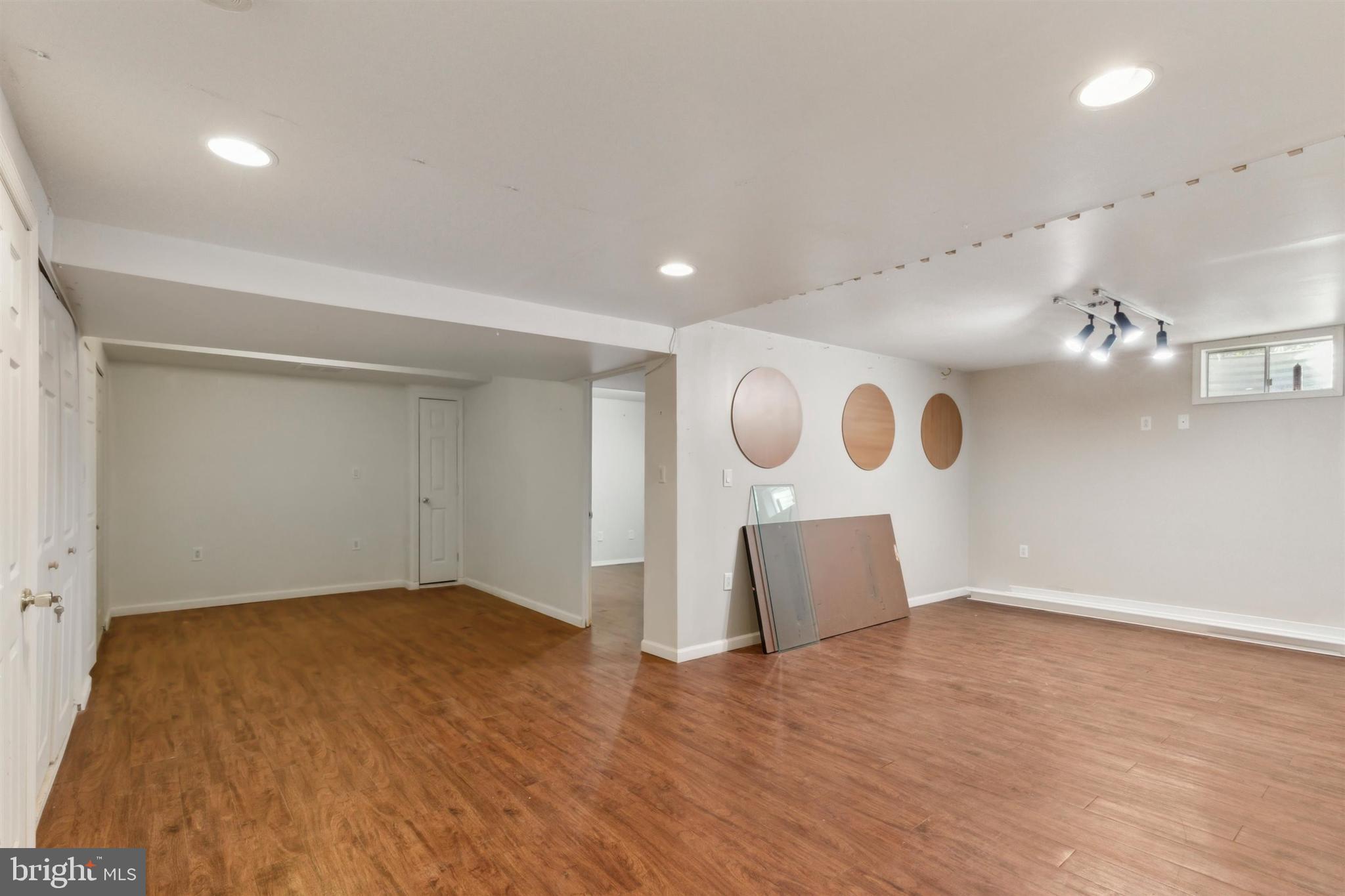 4420 Kelly Lane Reading, PA 19606 - Photo 21 of 25 an empty room with wooden floor and windows