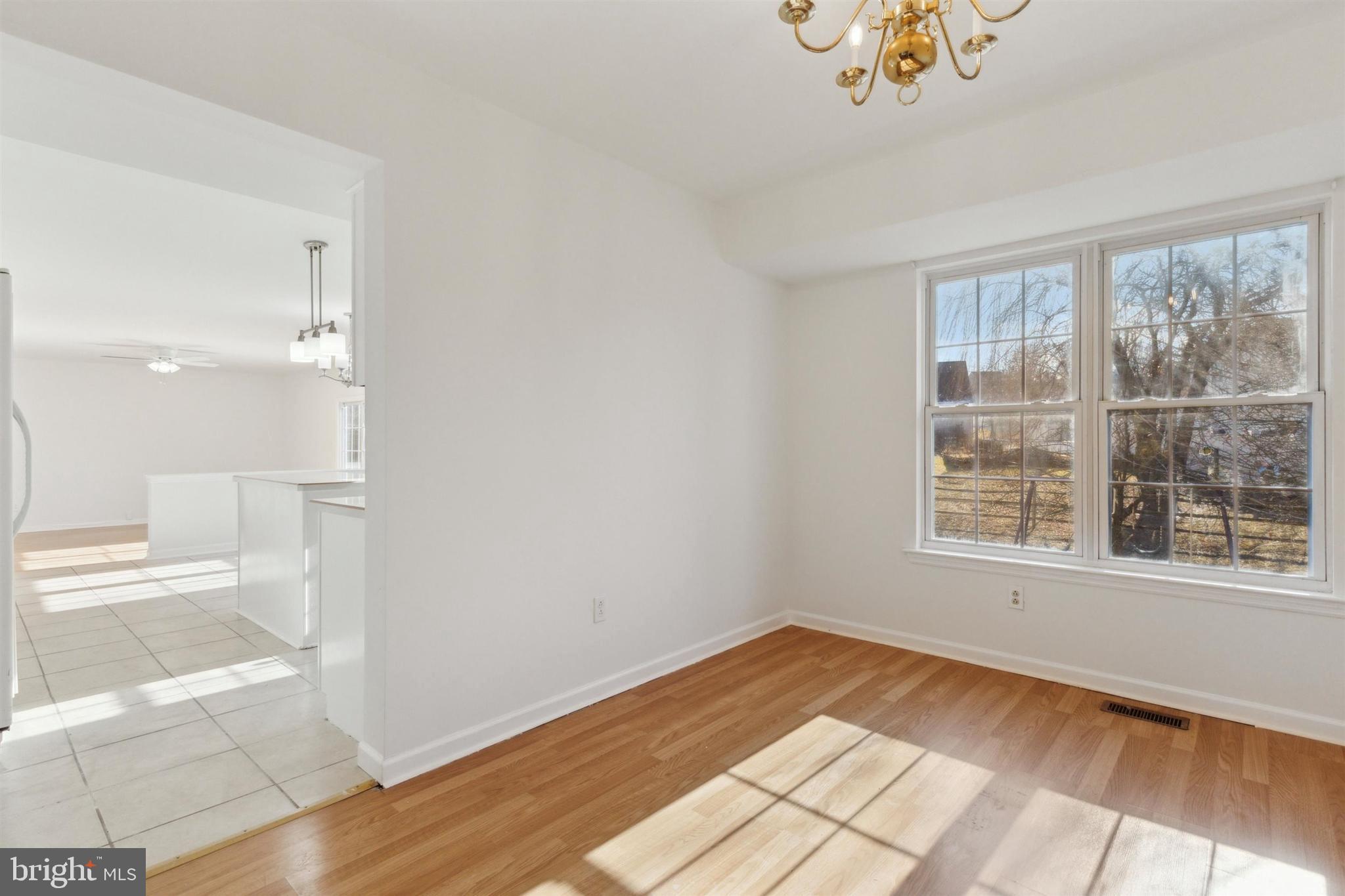 4420 Kelly Lane Reading, PA 19606 - Photo 6 of 25 a view of empty room with wooden floor and fan