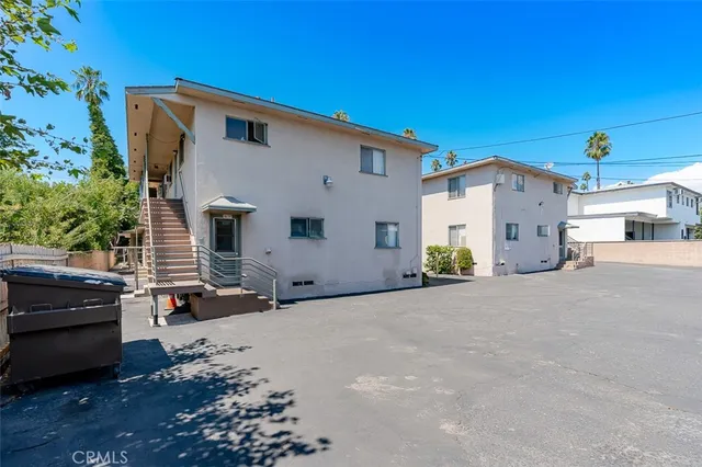 a view of a street with an outdoor space