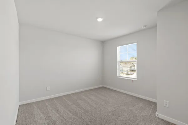 an empty room with a window