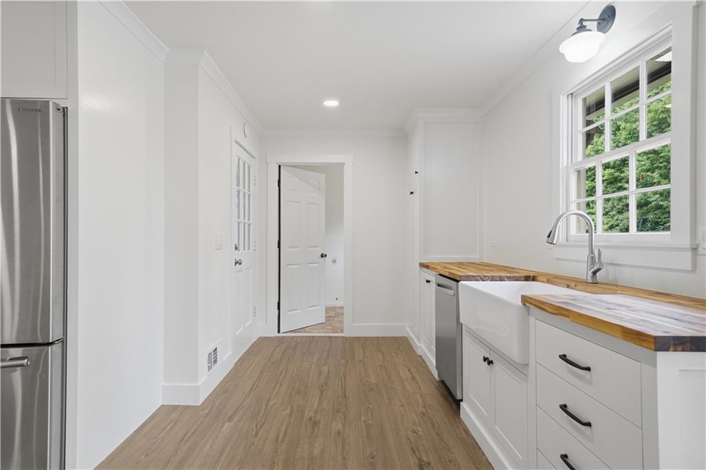 125 Childers Road Canton, GA 30115 - Photo 21 of 48 a room with a sink and a window