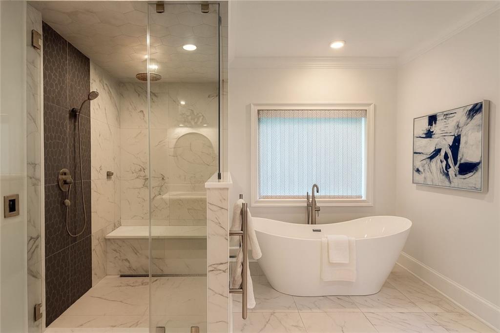 2928 Lavista Road Decatur, GA 30033 - Photo 14 of 15 a bathroom with a bathtub and shower