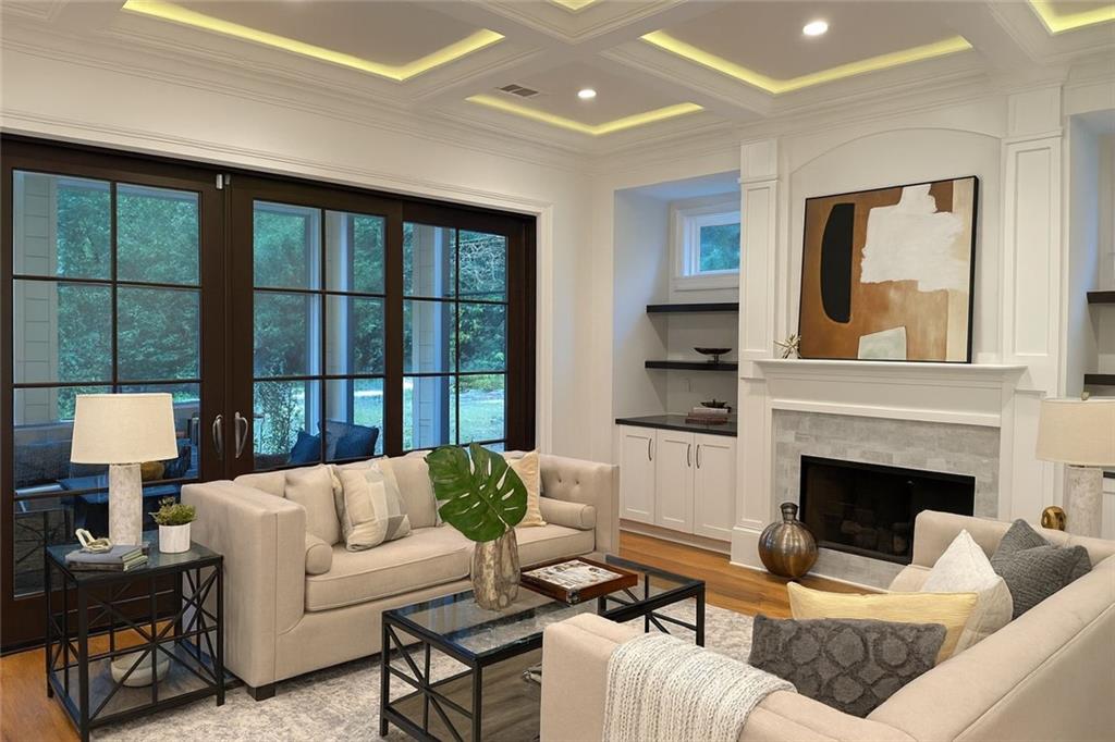 2928 Lavista Road Decatur, GA 30033 - Photo 10 of 15 a living room with furniture fireplace and a large window