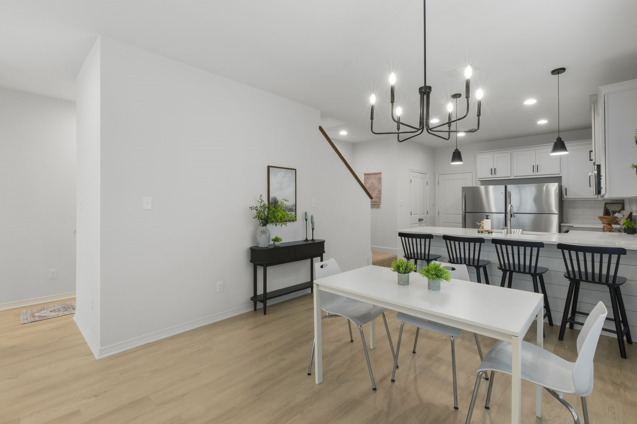 228 Richards Street College Station, TX 77840 - Photo 12 of 43 a view of a dining room with furniture and wooden floor