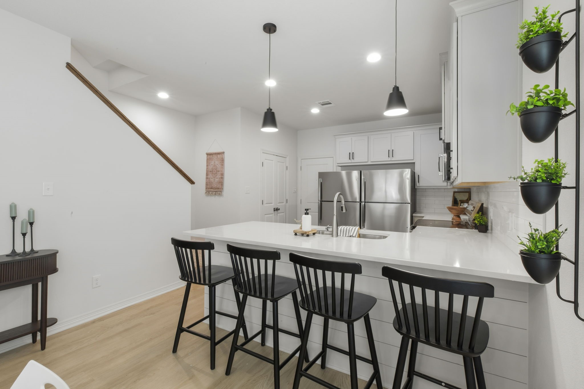 228 Richards Street College Station, TX 77840 - Photo 13 of 43 a view of a dining room with furniture and wooden floor
