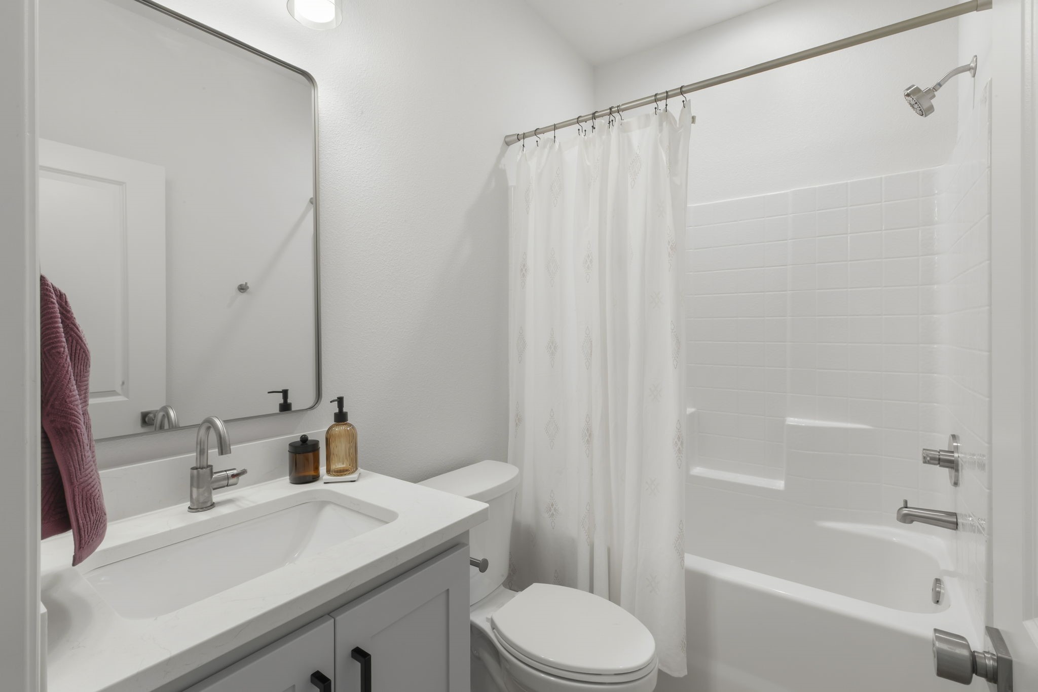 228 Richards Street College Station, TX 77840 - Photo 20 of 43 a bathroom with a sink toilet and shower