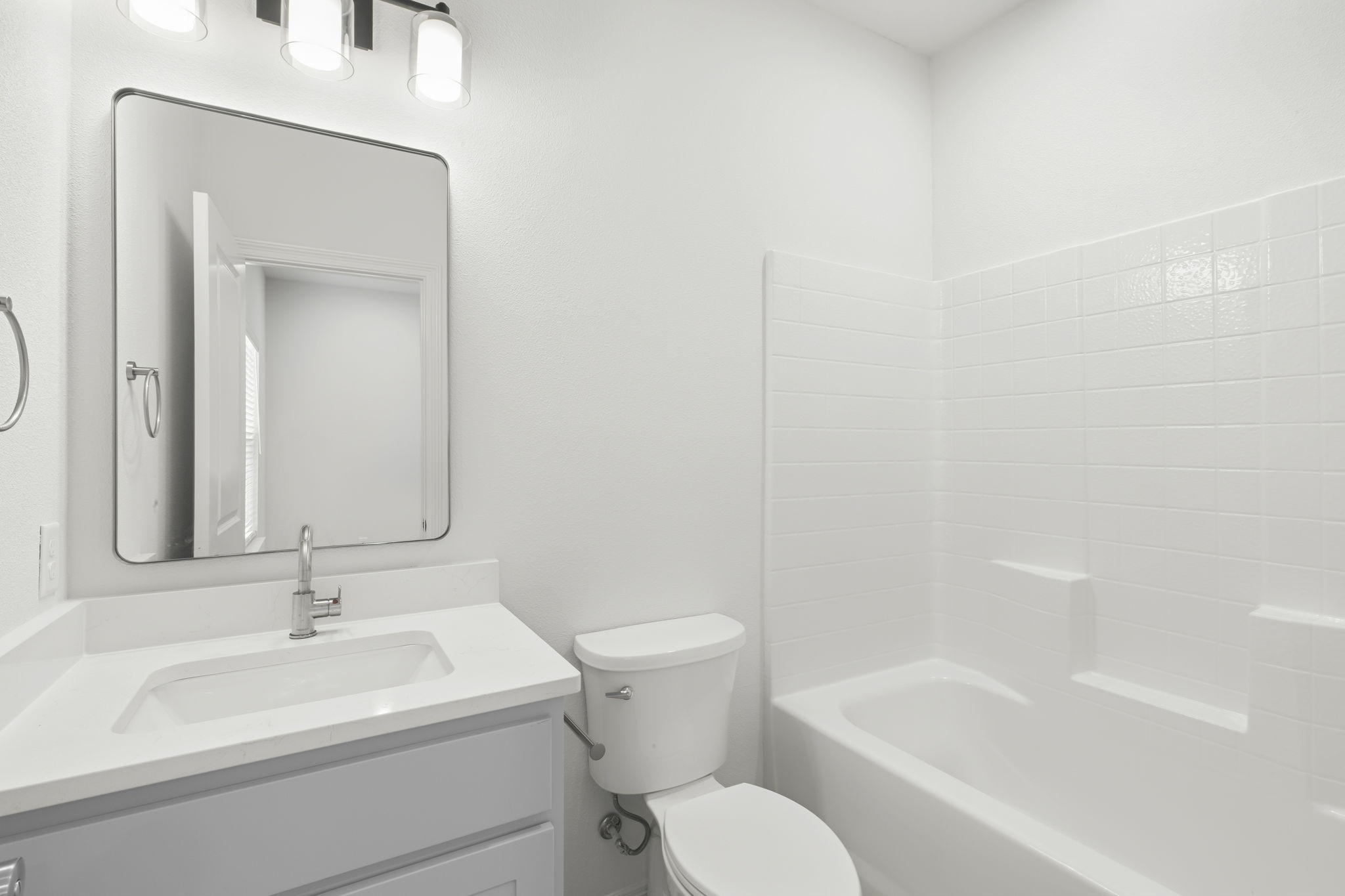 228 Richards Street College Station, TX 77840 - Photo 28 of 43 a bathroom with a sink toilet and shower