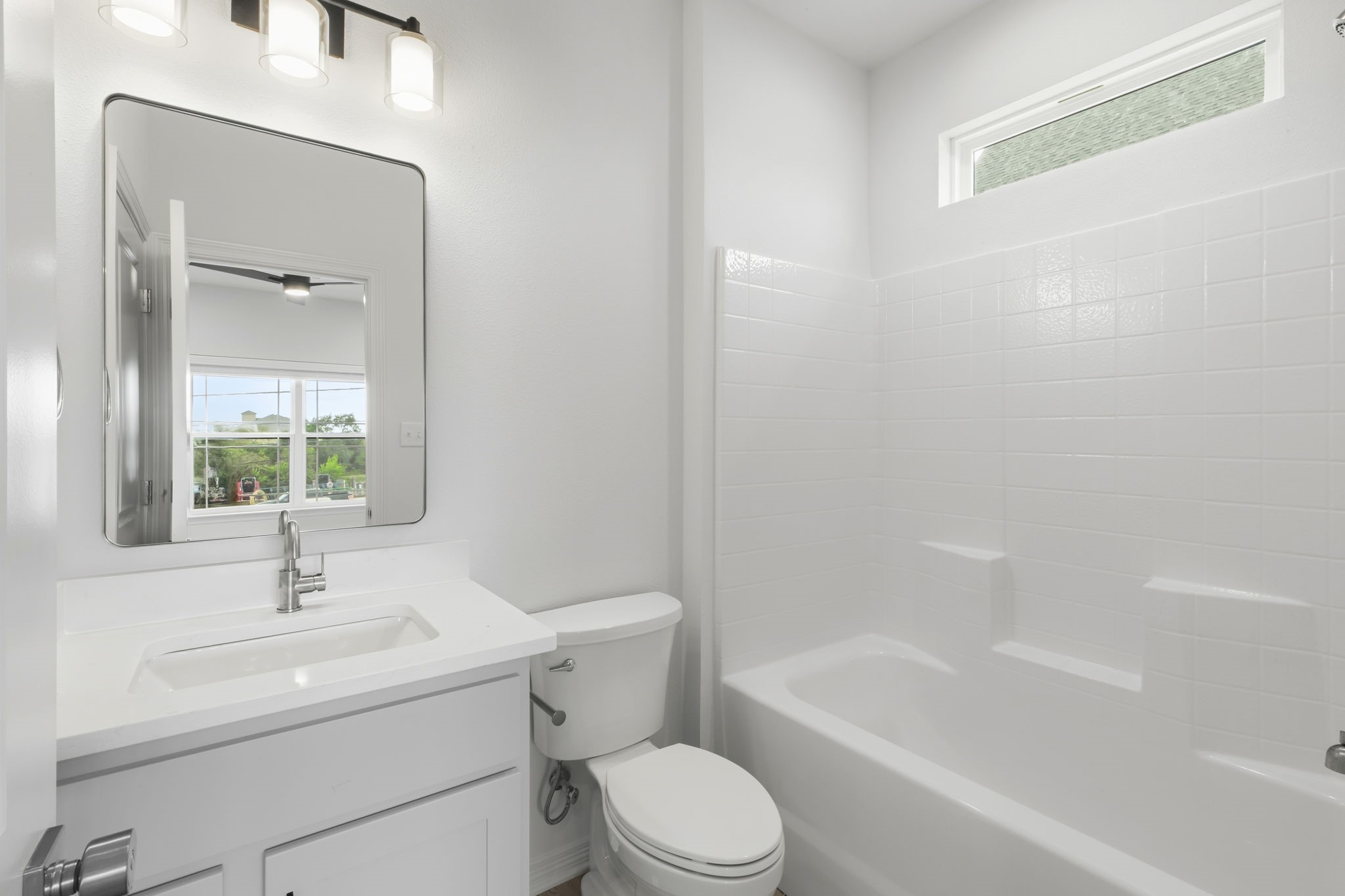 228 Richards Street College Station, TX 77840 - Photo 34 of 43 a bathroom with a sink toilet and a bathtub