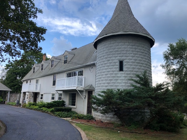 14935 West Old School Road Mettawa, IL 60048 - Photo 1 of 65 a front view of a house with garden