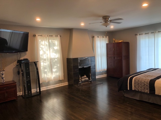 14935 West Old School Road Mettawa, IL 60048 - Photo 17 of 65 a view of a livingroom with furniture and a flat screen tv