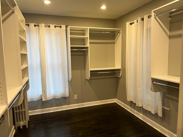 14935 West Old School Road Mettawa, IL 60048 - Photo 21 of 65 a view of walk in closet with wooden floor and a window