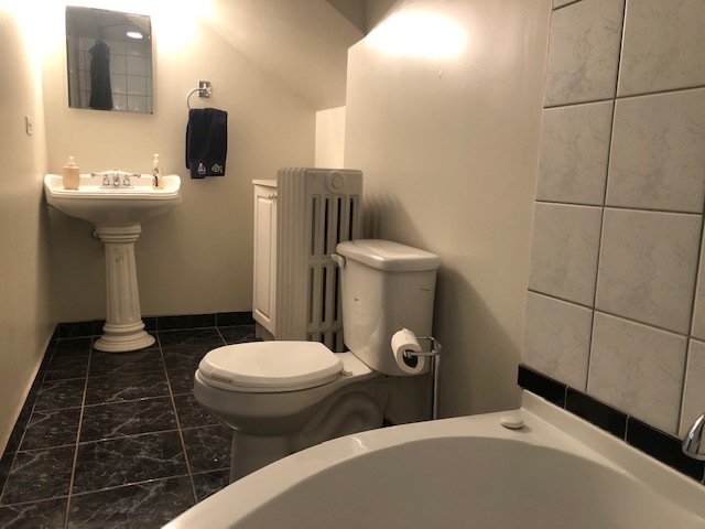 14935 West Old School Road Mettawa, IL 60048 - Photo 27 of 65 a bathroom with a toilet and a sink