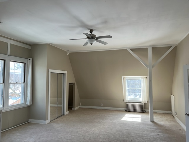 14935 West Old School Road Mettawa, IL 60048 - Photo 40 of 65 an empty room with windows and ceiling fan