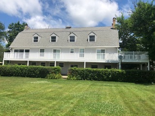 14935 West Old School Road Mettawa, IL 60048 - Photo 4 of 65 a front view of a house with garden