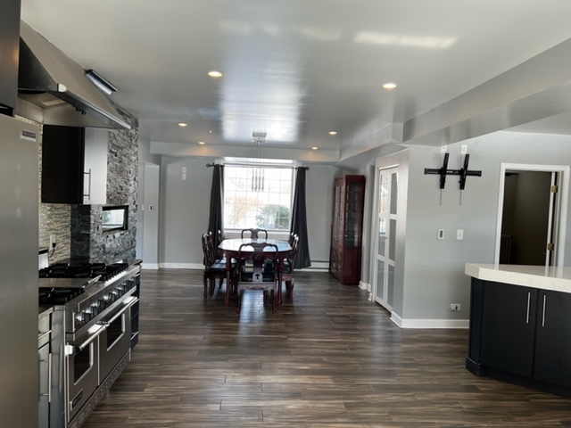 14935 West Old School Road Mettawa, IL 60048 - Photo 49 of 65 a view of a dining room with furniture window and wooden floor