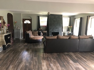 14935 West Old School Road Mettawa, IL 60048 - Photo 5 of 65 a living room with furniture and a fireplace