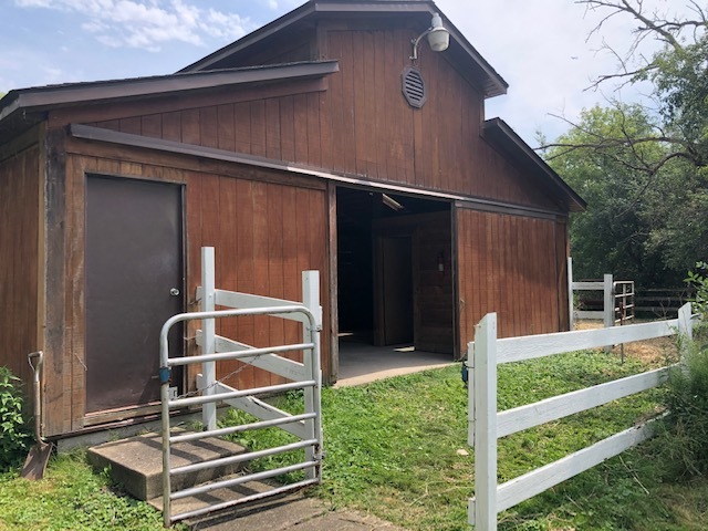 14935 West Old School Road Mettawa, IL 60048 - Photo 60 of 65 a front view of a house with a yard