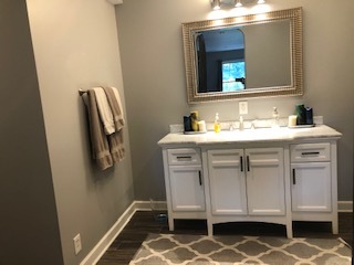 14935 West Old School Road Mettawa, IL 60048 - Photo 7 of 65 a bathroom with a sink and a mirror
