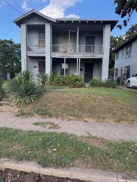 3900 Colonial Avenue Dallas, TX 75215 - Photo 15 of 15 a view of a brick house with a yard and large tree